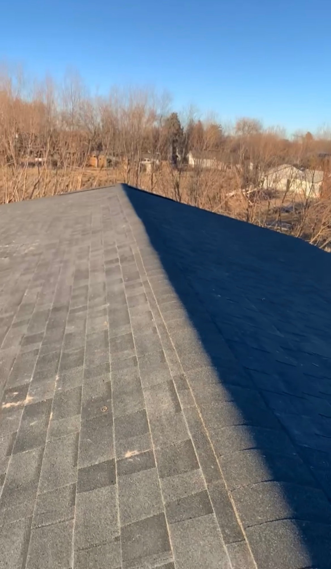New shingle roof ridge line on a residential home