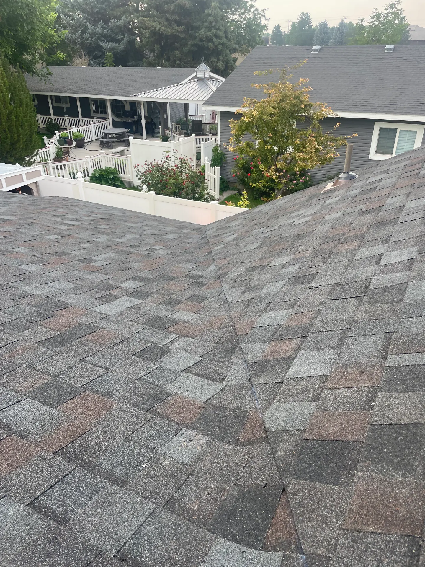 Multi-slope shingle roof finished on a residential home